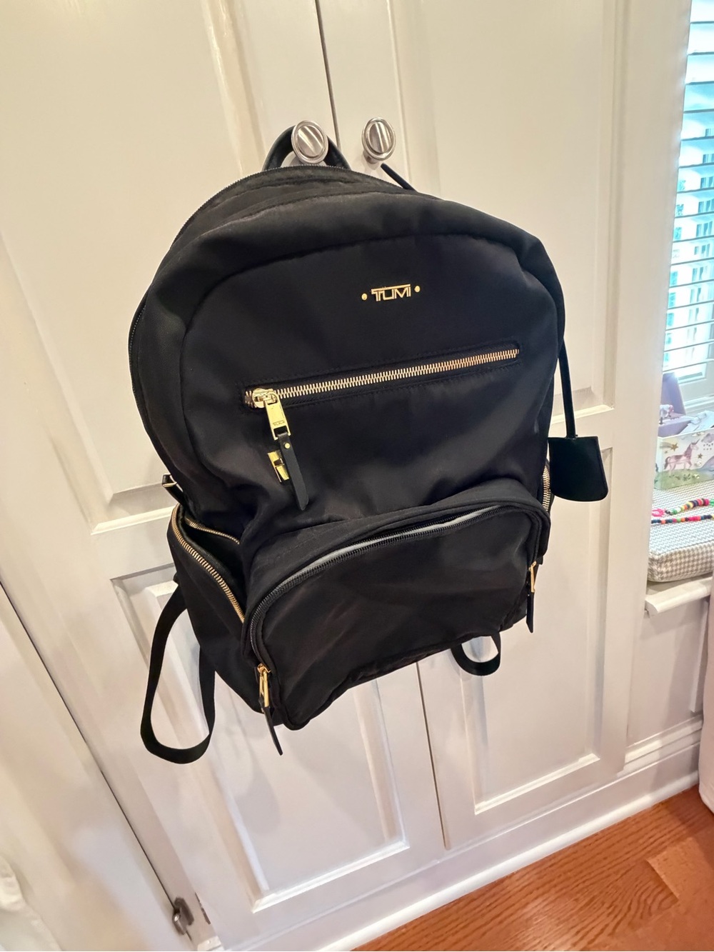 Tumi Voyageur Black Backpack with Gold Accents